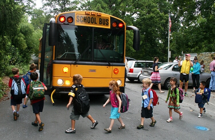 students entering school bus