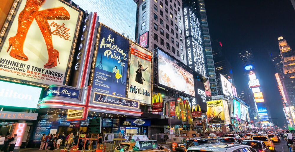 lighted billboards of the Broadway best show