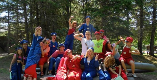 happy group of students in the woods