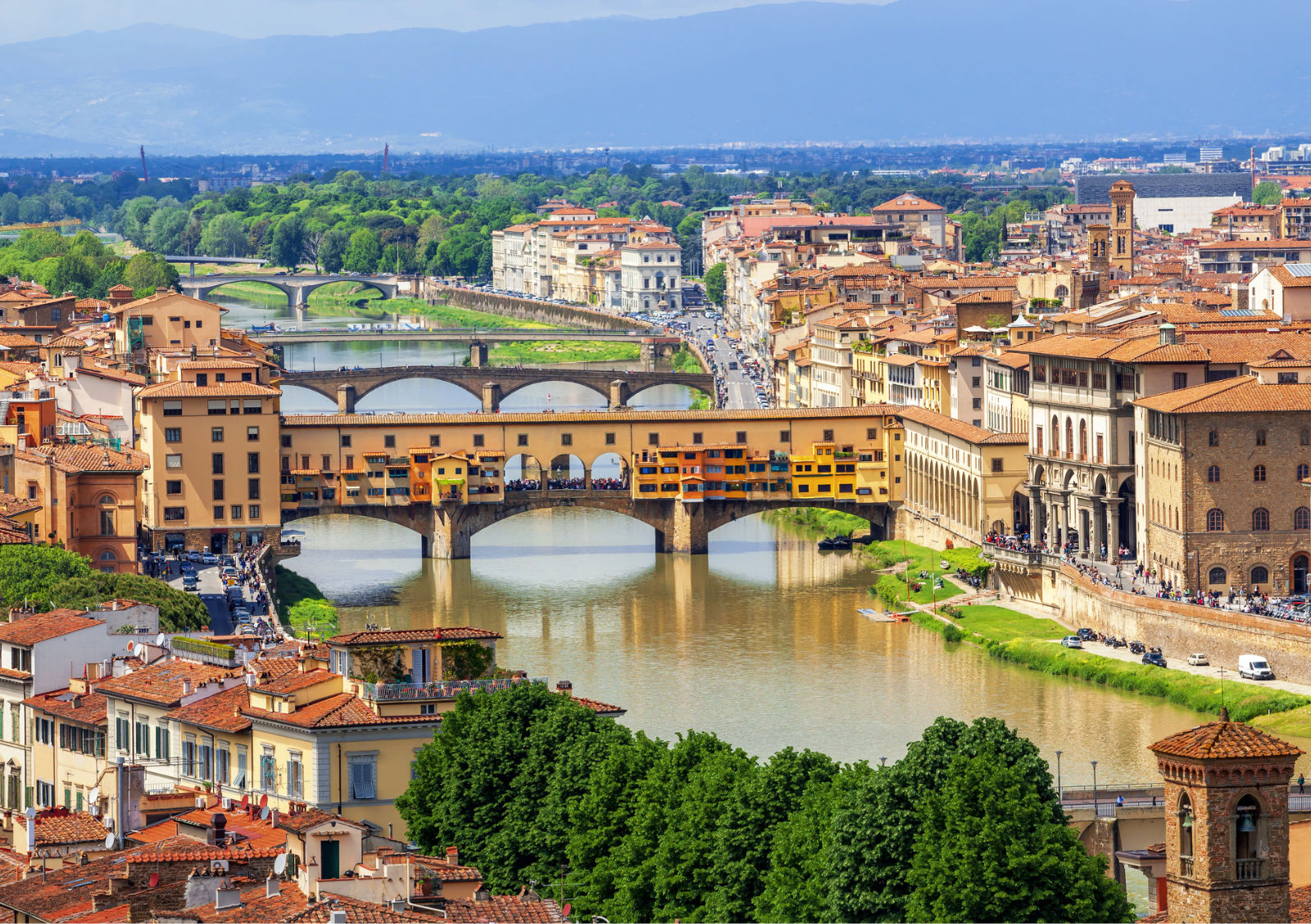 View of medieval stone bridge Ponte Vecchio over Arno river in Florence, Tuscany, Italy. Florence cityscape. Florence architecture and landmark.