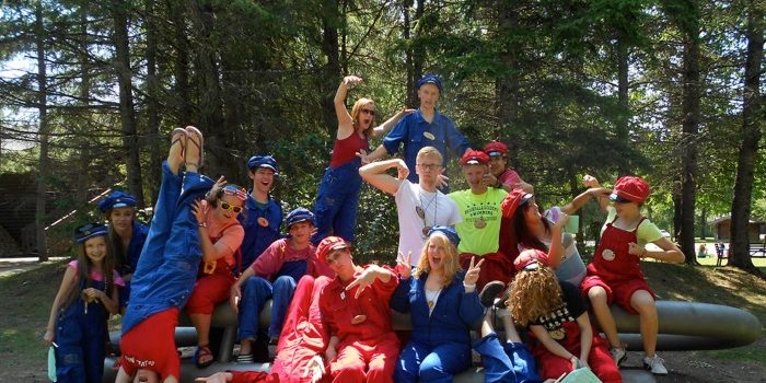 happy group of students in the woods