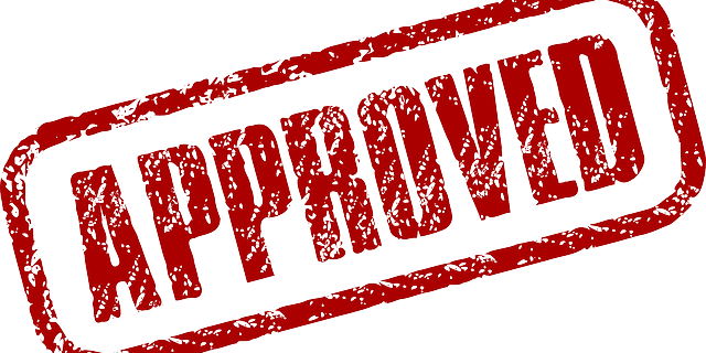 Approved stamped in red letters