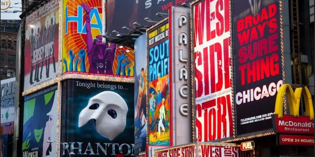 lighted billboards of the Broadway best show