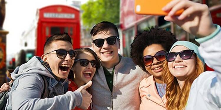 students taking selfie in London